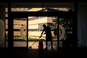 a man cleaning floor